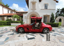 Mercedes SLS AMG at a mansion on Star Island
